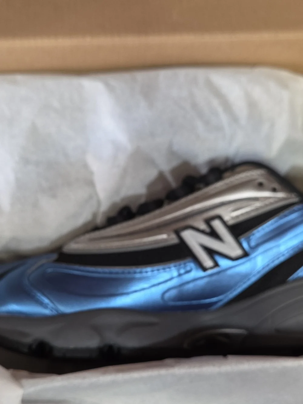 New Balance Metallic Blue and Silver Running Sneaker
